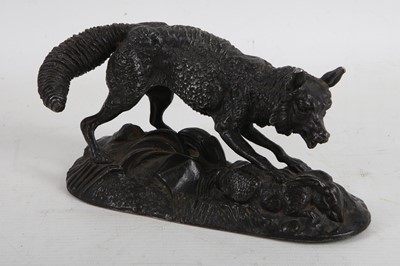 Lot 174 - A bronzed figure of a fox with a rabbit,...