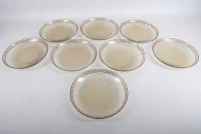 Lot 133 - A set of  8 swirled glass dessert plates with...