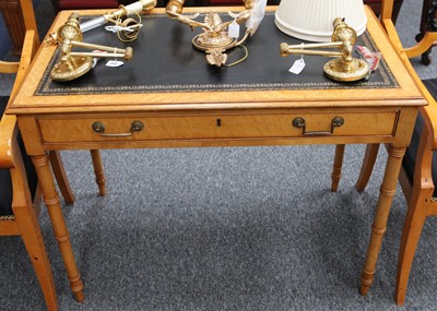 Lot 194 - A birds eye maple veneered writing table, with...