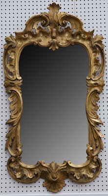 Lot 313 - A 19th Century giltwood wall mirror, the frame...