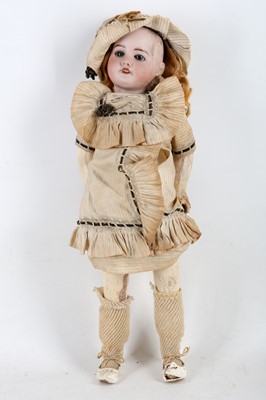 Lot 373 - An early 20th century bisque headed doll,...