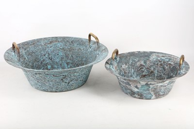 Lot 349 - Two bronze dragon fish spouting bowls, brass...