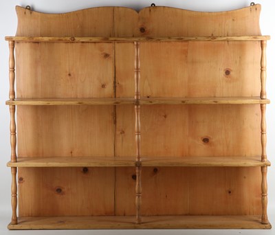 Lot 344 - A four tier Victorian pine shelving unit with...