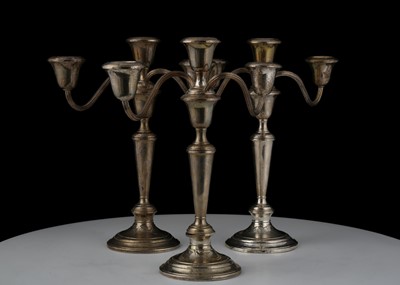 Lot 716 - Set of three Antique Sterling Silver candelabr...