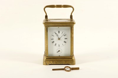 Lot 93 - A brass and 5 glass alarm carriage clock with...