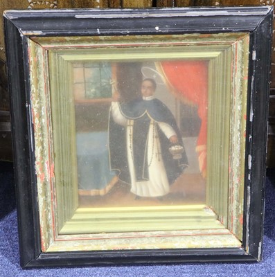 Lot 114 - An oil painted portrait of a martyred saint in...