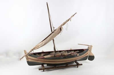 Lot 253 - A mid 20th Century scratch built sail boat...