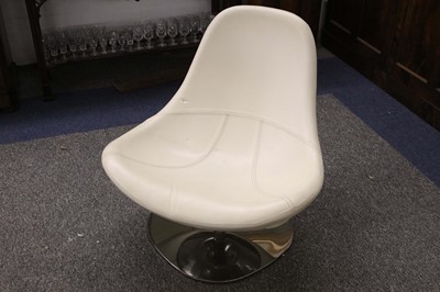 Lot 256 - A white leather chair with chrome base.