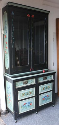 Lot 236 - An Edwardian painted bookcase over chest with...