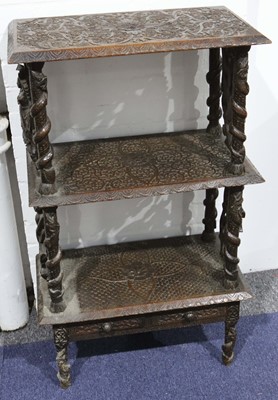 Lot 233 - An early 20th Century Indian carved Etagere...