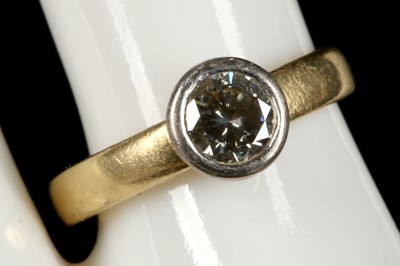 Lot 439 - An 18ct gold and diamond solitaire ring.