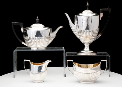 Lot 434 - A George VI sterling silver four-piece tea set,...