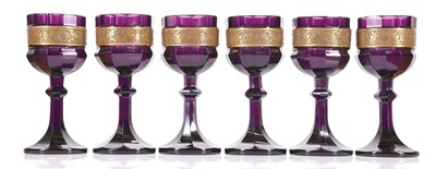 Lot 370 - A SET OF SIX FACETED MOSER KARLSBAD AMETHYST...