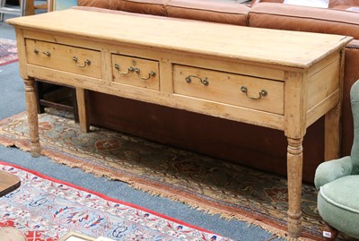 Lot 420 - A late Georgian pine dresser with drawers...