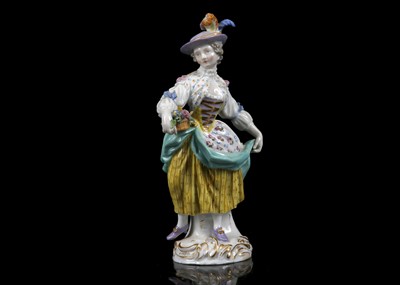 Lot 409 - A MEISSEN PORCELAIN FIGURE OF A FLOWER GIRL,...