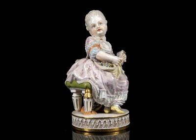 Lot 398 - A MEISSEN PORCELAIN FIGURE OF A GIRL READING,...