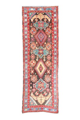 Lot 25 - A SOUTH CAUCASIAN RUNNER approx: 12ft. x...