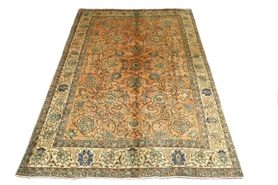 Lot 37 - A TABRIZ CARPET, NORTH-WEST PERSIA, CIRCA 1940....