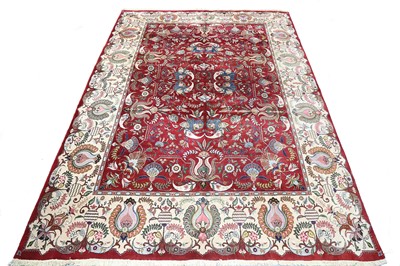 Lot 42 - A SIGNED TABRIZ CARPET, NORTH-WEST PERSIA,...