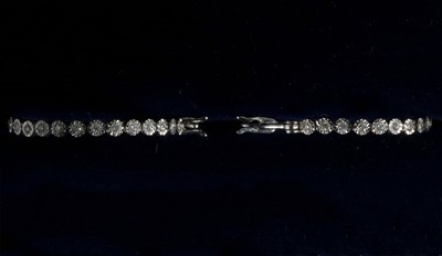 Lot 345 - A pair of 18ct white gold and diamond hoop...