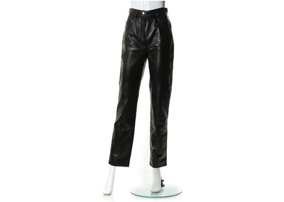 Lot 555 - Christian Dior black leather trousers,...