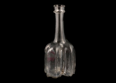 Lot 162 - AN EARLY GLASS CRUCIFORM SERVING BOTTLE, circa...