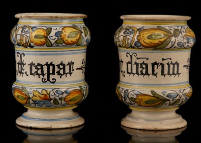 Lot 102 - A PAIR OF SMALL ITALIAN MAIOLICA DRUG JARS,...