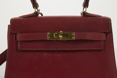 Lot 229 - Hermes red Courchevel leather Mini Kelly 20, c....