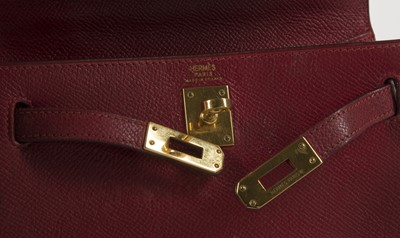 Lot 229 - Hermes red Courchevel leather Mini Kelly 20, c....