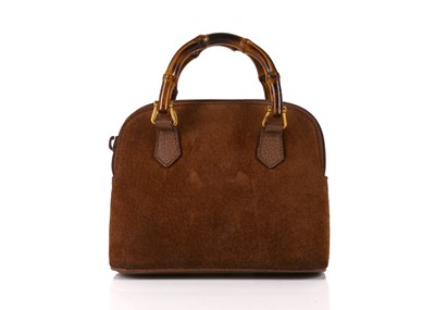 Lot 203 - Gucci brown suede mini bamboo bag, of Alma...