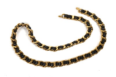 Lot 601 - Chanel black and gold chain belt, early 1980s,...