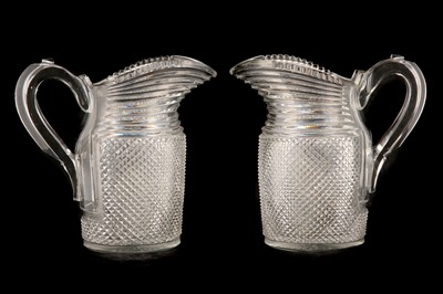 Lot 178 - A FINE PAIR OF REGENCY CUT GLASS WATER JUGS,...