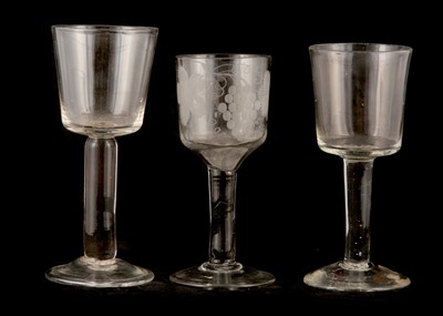 Lot 163 - THREE PLAIN STEMMED GLASS WINE GOBLETS, mid...