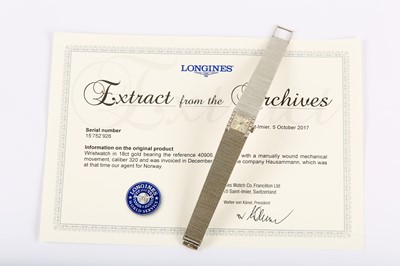 Lot 32 - LONGINES. AN 18K WHITE GOLD AND DIAMOND SET...