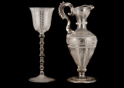 Lot 193 - AN ENGRAVED GLASS EWER AND A TALL ENGRAVED...