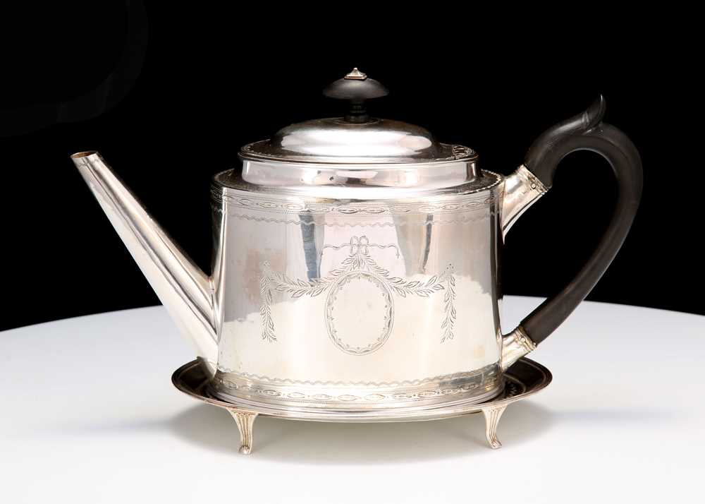 Lot 476 - A George III antique sterling silver teapot on...