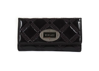 Lot 575 - Versace black patent leather wallet, with...