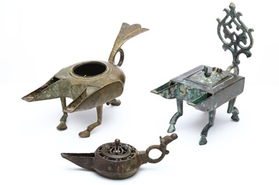 Lot 36 - THREE SELJUK BRONZE OIL LAMPS. Iran. 12th/13th...