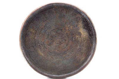 Lot 43 - A SELJUK BRONZE DISH, decorated with fine...