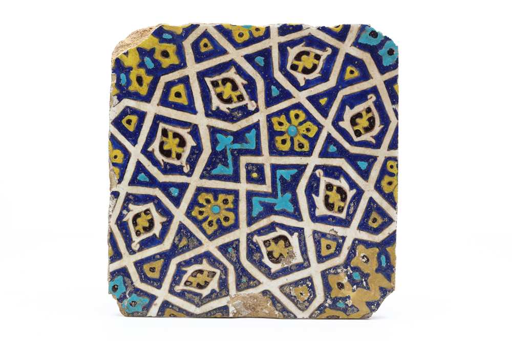 Lot 58 - A FINE TIMURID CUERDA SECA GLAZED CERAMIC TILE,...