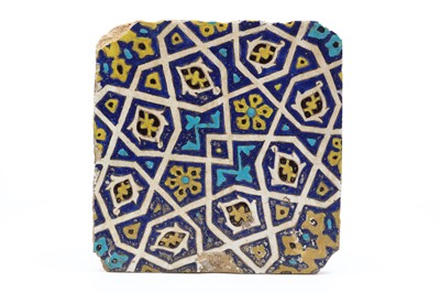 Lot 58 - A FINE TIMURID CUERDA SECA GLAZED CERAMIC TILE,...