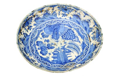 Lot 63 - A FINE SAFAVID BLUE AND WHITE GLAZED CERAMIC...