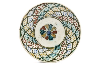 Lot 64 - A KUBACHI-TYPE SAFAVID GLAZED CERAMIC DISH,...