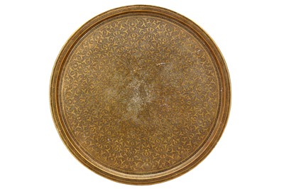 Lot 95 - A VERY LARGE CIRCULAR PERSIAN QAJAR BRASS TRAY,...