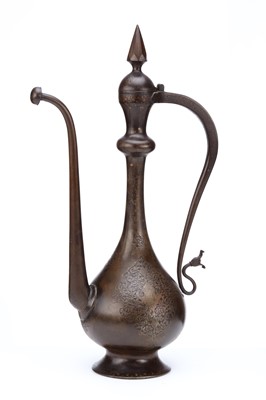 Lot 96 - A LARGE PERSIAN QAJAR CHISELLED STEEL EWER,...