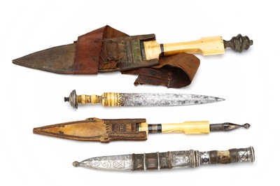 Lot 115 - FOUR SOMALI AND TUAREG DAGGERS.  19th century.