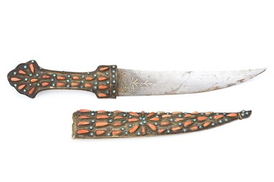 Lot 120 - A FINE OTTOMAN DAGGER, inset with coral and...