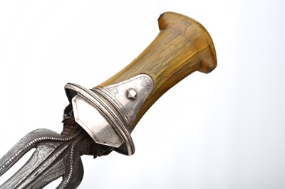 Lot 138 - A UNUSUAL INDONESIAN DAGGER,  with horn hilt...