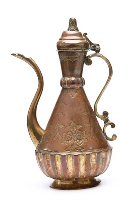 Lot 166 - A LARGE OTTOMAN GILDED COPPER TOMBAK EWER,...