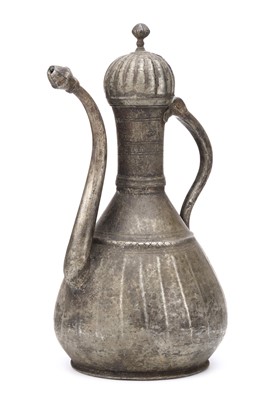 Lot 174 - A TURKISH OTTOMAN TINNED COPPER EWER, bearing '...